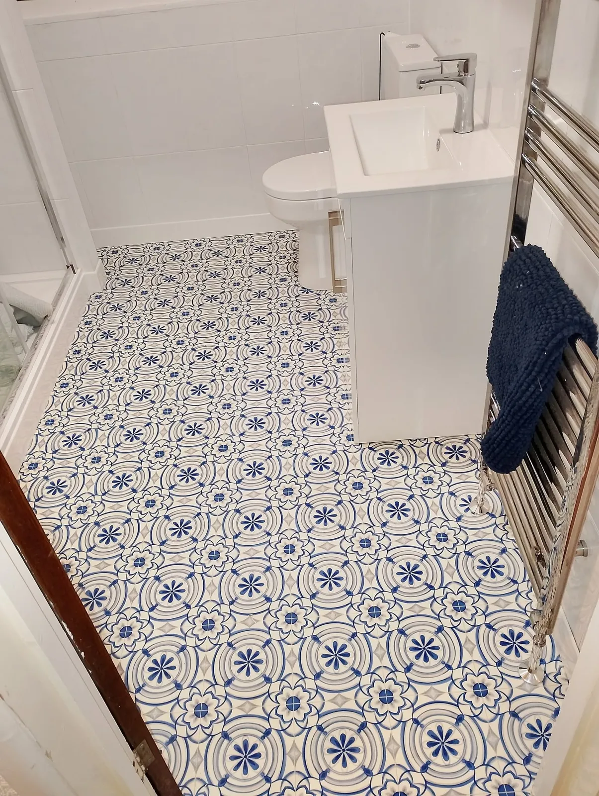 After: Dated bathroom out, new shower room in