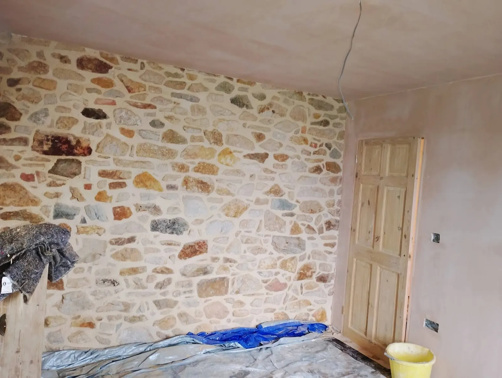 Exposed stone feature wall cleaned up and pointed